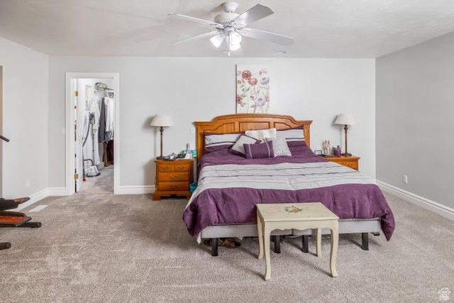 3011 N 1000 W, Pleasant View, UT 84414 - bedroom with carpet, baseboards, and ceiling fan