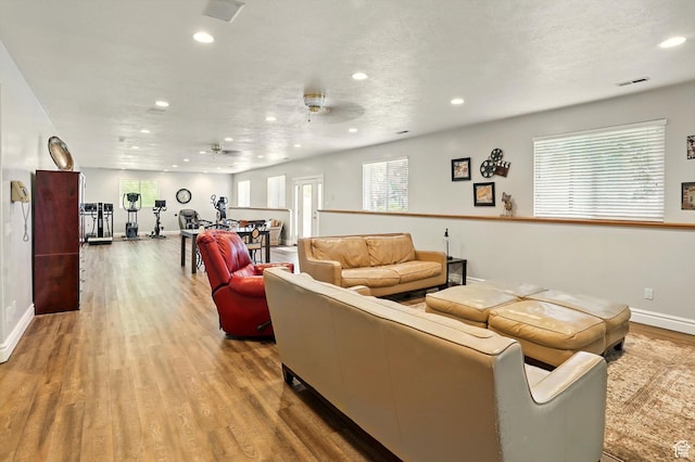 3011 N 1000 W, Pleasant View, UT 84414 - living room featuring recessed lighting, wood finished floors, and a ceiling fan
