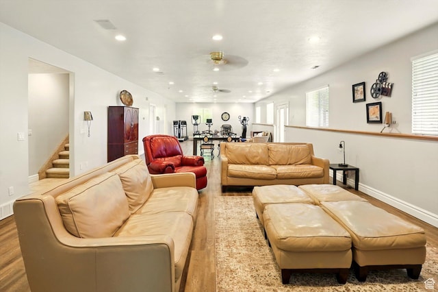 3011 N 1000 W, Pleasant View, UT 84414 - living room featuring wood finished floors, a ceiling fan, recessed lighting, and stairs