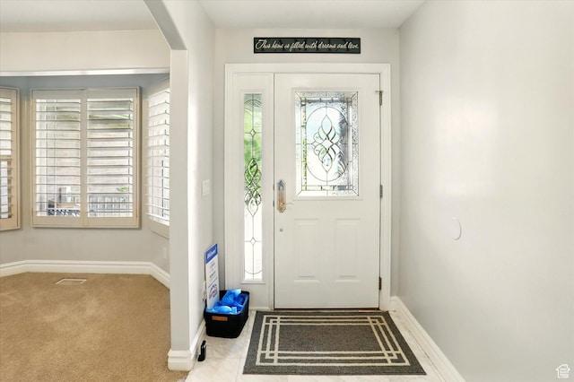 3011 N 1000 W, Pleasant View, UT 84414 - entryway with arched walkways and carpet floors