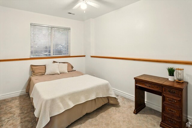 3011 N 1000 W, Pleasant View, UT 84414 - bedroom with light colored carpet and ceiling fan