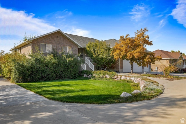 3011 N 1000 W, Pleasant View, UT 84414 - view of front facade with brick siding, a front lawn, stairway, and an attached garage