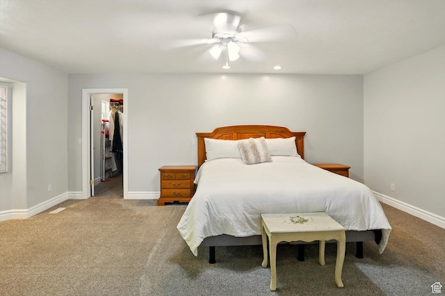 3011 N 1000 W, Pleasant View, UT 84414 - bedroom featuring carpet flooring, a walk in closet, ceiling fan, and a closet