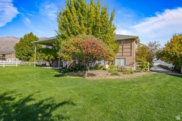 3011 N 1000 W, Pleasant View, UT 84414 - exterior space featuring fence and a yard