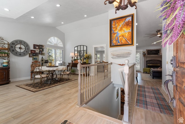 376 W Golden Harvest Rd, Draper, UT 84020 - interior space featuring baseboards, a fireplace, wood finished floors, recessed lighting, and vaulted ceiling