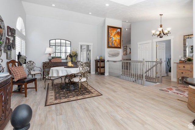 376 W Golden Harvest Rd, Draper, UT 84020 - dining space featuring an inviting chandelier, plenty of natural light, and high vaulted ceiling