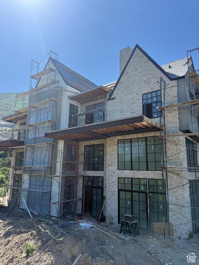 2019 E Graystone Ct, Draper, UT 84020 - back of house with stone siding and a chimney