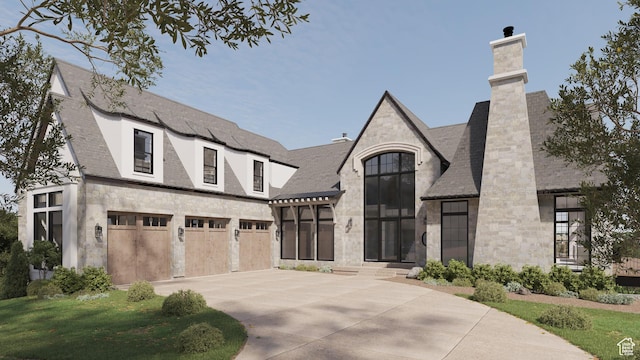 view of front facade with stone siding, concrete driveway, an attached garage, and a chimney