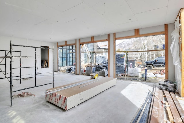 misc room with concrete flooring