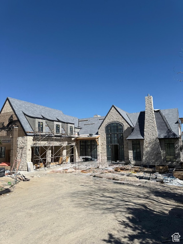 2019 E Graystone Ct, Draper, UT 84020 - view of front of home with stone siding and a chimney