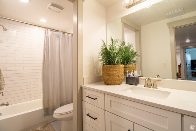 1438 N Jerry Gertsch Ln, Midway, UT 84049 - bathroom featuring shower / tub combo with curtain, visible vents, toilet, and vanity