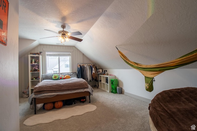 1438 N Jerry Gertsch Ln, Midway, UT 84049 - carpeted bedroom with visible vents, a ceiling fan, lofted ceiling, and a textured ceiling