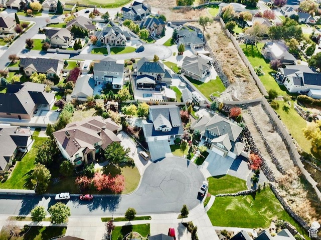 birds eye view of property with a residential view