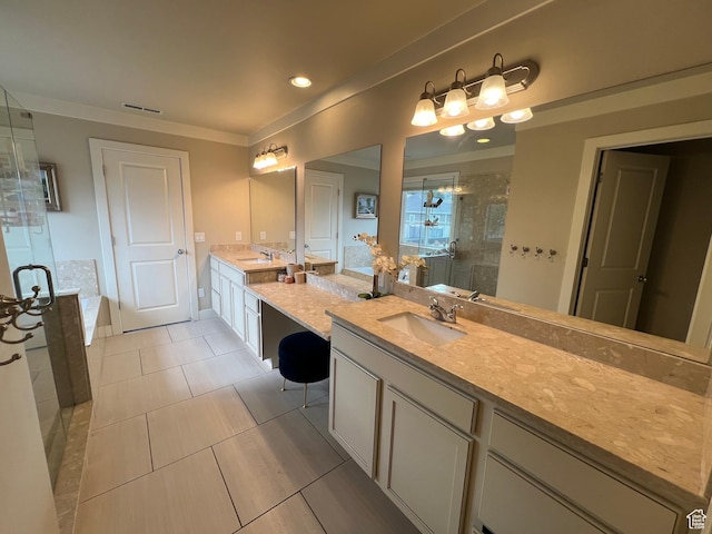 bathroom with vanity, ornamental molding, a shower stall, tile patterned floors, and visible vents