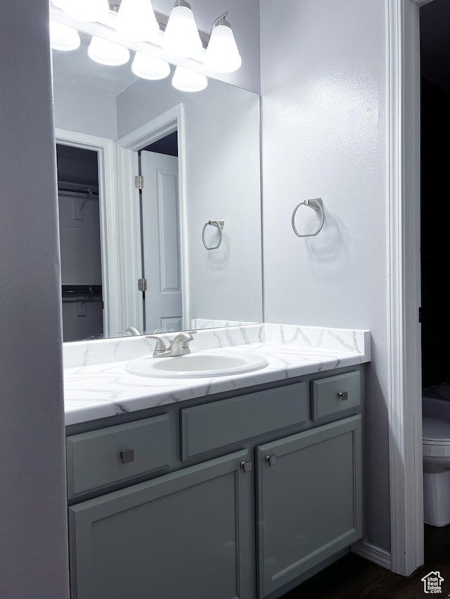 5498 Scarsborough Way, Stansbury Park, UT 84074 - bathroom featuring vanity and toilet