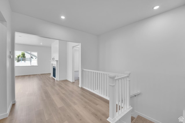 253 E Polaris Dr Unit 105, Saratoga Springs, UT 84045 - hallway featuring an upstairs landing, light wood-style floors, and recessed lighting
