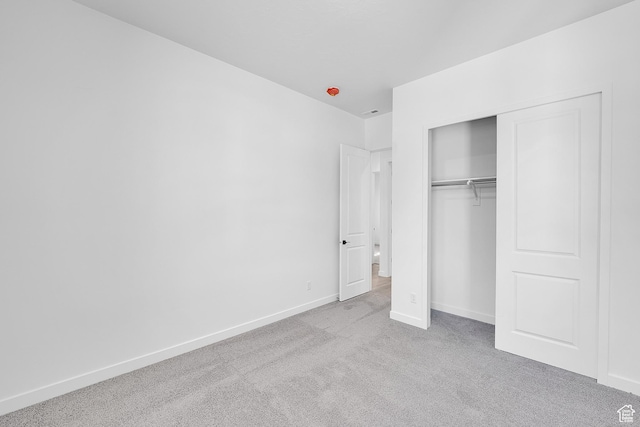 253 E Polaris Dr Unit 105, Saratoga Springs, UT 84045 - unfurnished bedroom featuring carpet and a closet