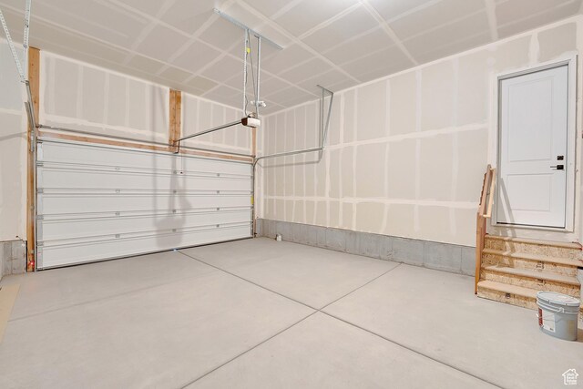 253 E Polaris Dr Unit 105, Saratoga Springs, UT 84045 - garage with a garage door opener