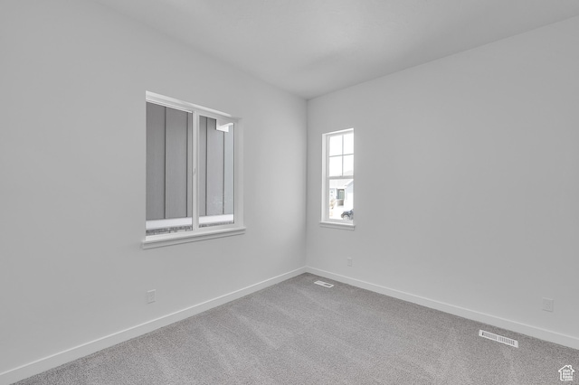 253 E Polaris Dr Unit 105, Saratoga Springs, UT 84045 - carpeted empty room featuring baseboards