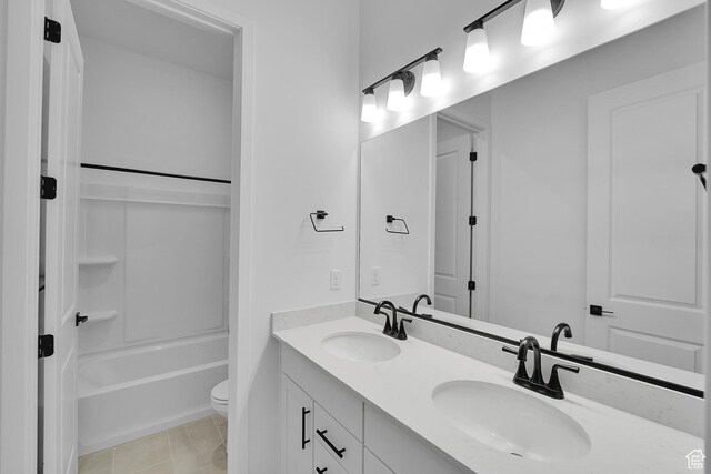 253 E Polaris Dr Unit 105, Saratoga Springs, UT 84045 - full bath with double vanity,  shower combination, and tile patterned floors