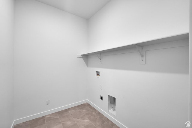 253 E Polaris Dr Unit 105, Saratoga Springs, UT 84045 - washroom with hookup for a washing machine and baseboards