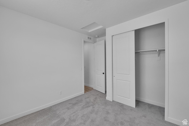 3198 S Blue Heron Dr E Unit 609, Saratoga Springs, UT 84045 - unfurnished bedroom with carpet floors, a closet, and attic access