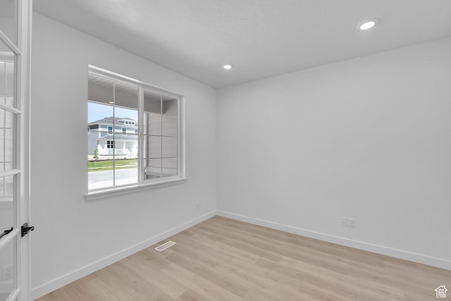 3198 S Blue Heron Dr E Unit 609, Saratoga Springs, UT 84045 - unfurnished room with light wood-type flooring and recessed lighting
