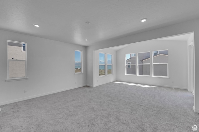 3198 S Blue Heron Dr E Unit 609, Saratoga Springs, UT 84045 - carpeted spare room featuring baseboards and recessed lighting