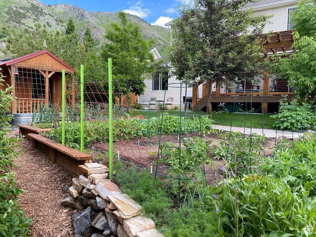 1869 Southpointe Ct, Logan, UT 84341 - view of yard featuring a mountain view and a vegetable garden