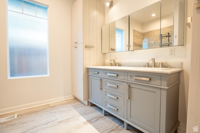 1197 S 700 E, Salt Lake City, UT 84105 - full bath with double vanity, tiled shower, and baseboards