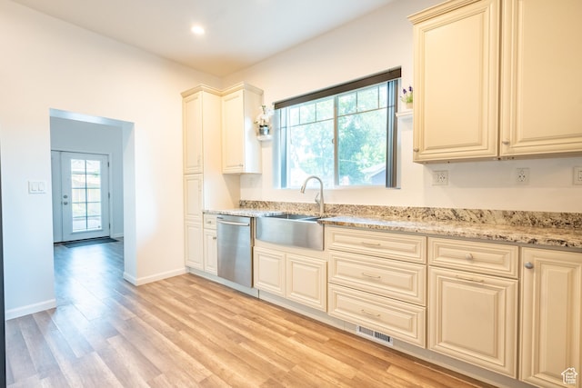 1197 S 700 E, Salt Lake City, UT 84105 - kitchen featuring dishwasher, a sink, light wood-style flooring, light stone countertops, and cream cabinetry