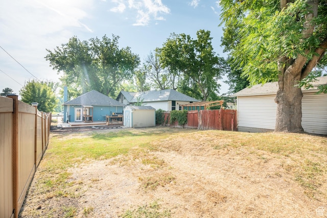 1197 S 700 E, Salt Lake City, UT 84105 - view of yard featuring a storage shed and an outbuilding