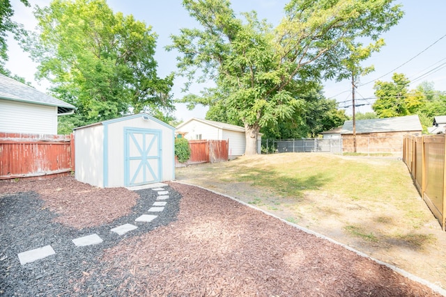 1197 S 700 E, Salt Lake City, UT 84105 - view of yard with a storage shed and an outbuilding