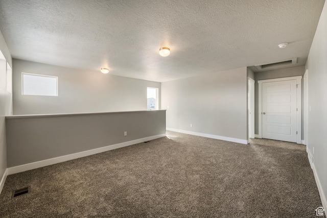 3807 W 1760 S Unit 207, Taylor, UT 84401 - empty room featuring carpet floors, a healthy amount of sunlight, and visible vents