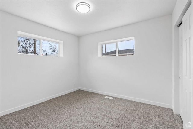 4880 S 4380 W, Salt Lake City, UT 84118 - unfurnished bedroom with a closet, baseboards, visible vents, and carpet