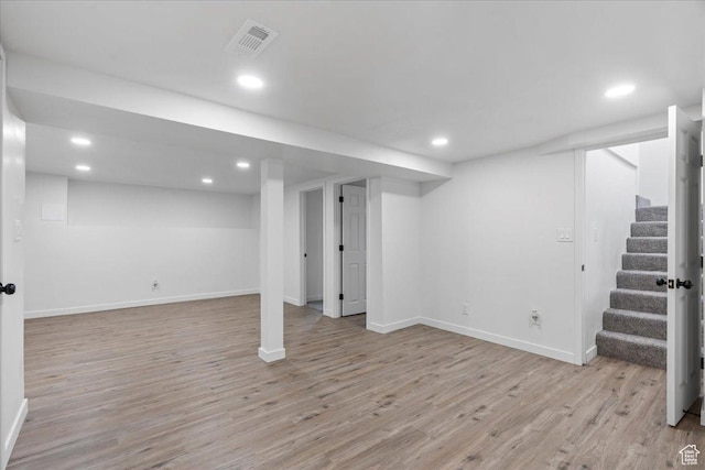 4880 S 4380 W, Salt Lake City, UT 84118 - finished basement with visible vents, recessed lighting, light wood-style floors, and stairway