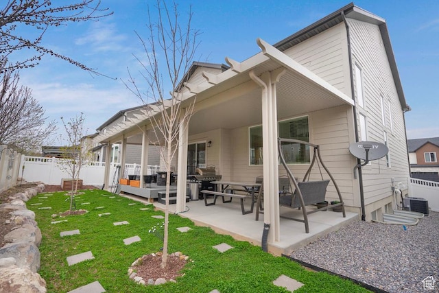 4143 W Gate Keeper Dr, Herriman, UT 84096 - back of house with a patio area, cooling unit, and an outdoor hangout area