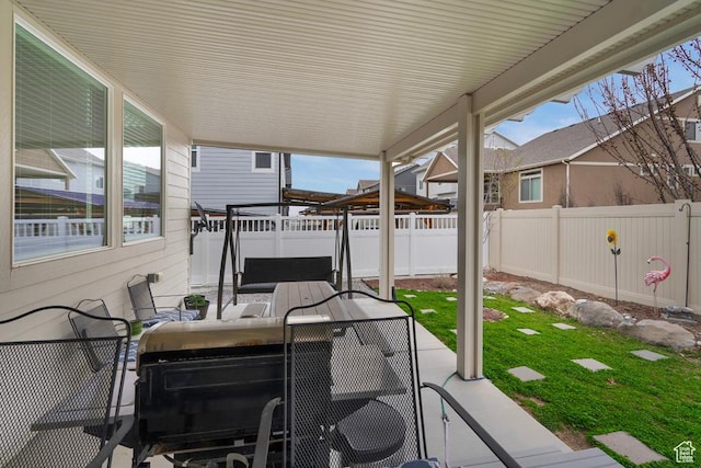 4143 W Gate Keeper Dr, Herriman, UT 84096 - view of patio with a fenced backyard and an outdoor hangout area