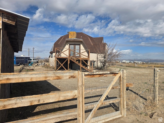 3379 S 1750 E, Price, UT 84501 - view of outbuilding with fence, stairs, and a rural view