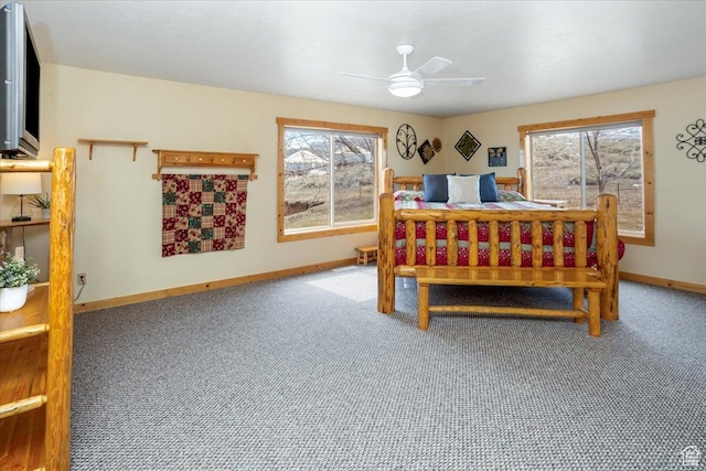 792 S Spruce Dr S, Garden City, UT 84028 - bedroom with baseboards, carpet floors, and a ceiling fan