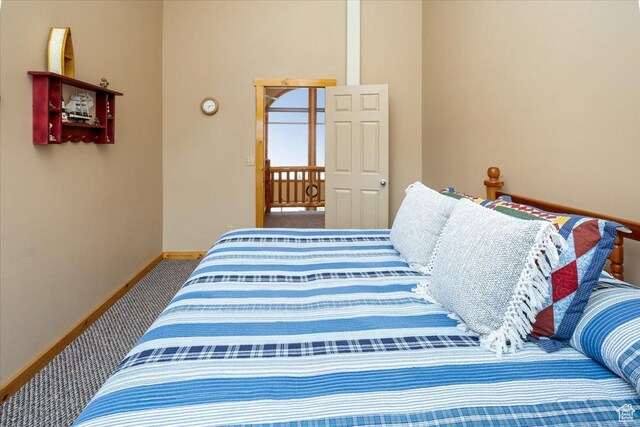 792 S Spruce Dr S, Garden City, UT 84028 - bedroom featuring baseboards and carpet