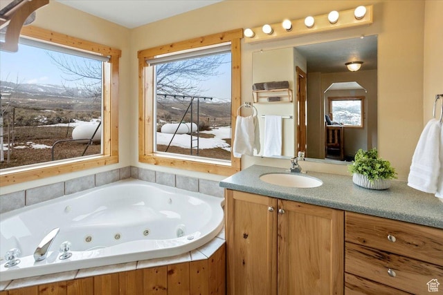 792 S Spruce Dr S, Garden City, UT 84028 - bathroom featuring vanity and a whirlpool tub