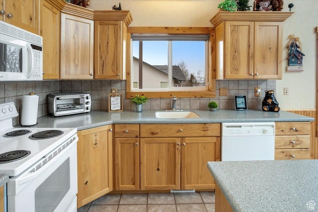 792 S Spruce Dr S, Garden City, UT 84028 - kitchen with white appliances, light countertops, a sink, and a toaster