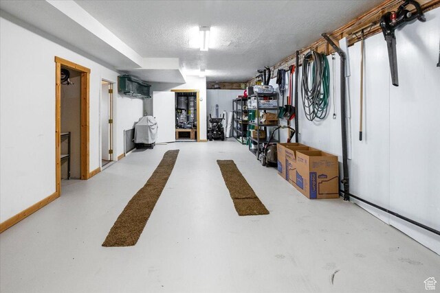 792 S Spruce Dr S, Garden City, UT 84028 - finished below grade area featuring baseboards and a textured ceiling