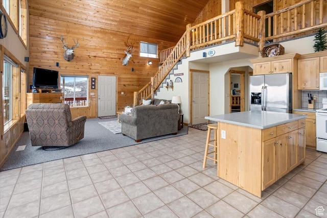 792 S Spruce Dr S, Garden City, UT 84028 - kitchen featuring open floor plan, wooden ceiling, wood walls, and white appliances
