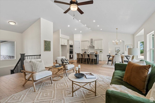 3779 S Old Wood, West Valley City, UT 84120 - living room with light wood-style flooring, ceiling fan, a chandelier, recessed lighting, and high vaulted ceiling