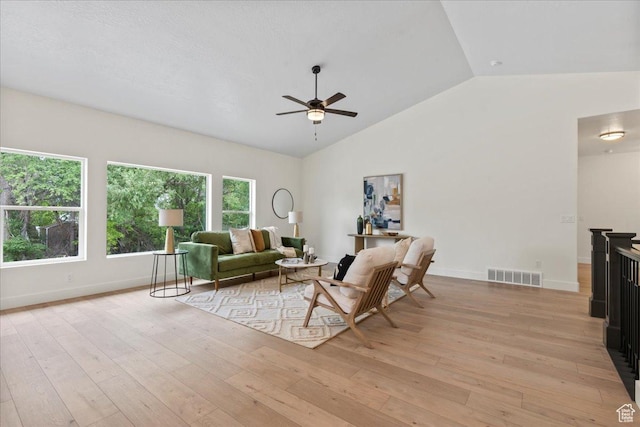 3779 S Old Wood, West Valley City, UT 84120 - living area featuring a ceiling fan, lofted ceiling, light wood-style floors, and baseboards