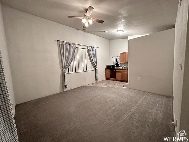 2103 S Mountain Vista Ln E, Provo, UT 84606 - spare room with light carpet and a ceiling fan