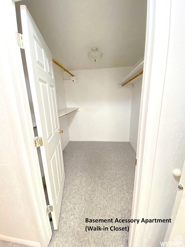 2103 S Mountain Vista Ln E, Provo, UT 84606 - walk in closet featuring carpet flooring
