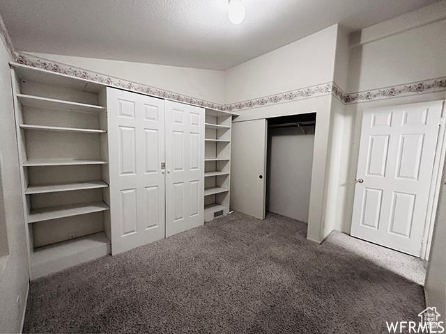 2103 S Mountain Vista Ln E, Provo, UT 84606 - unfurnished bedroom featuring carpet flooring